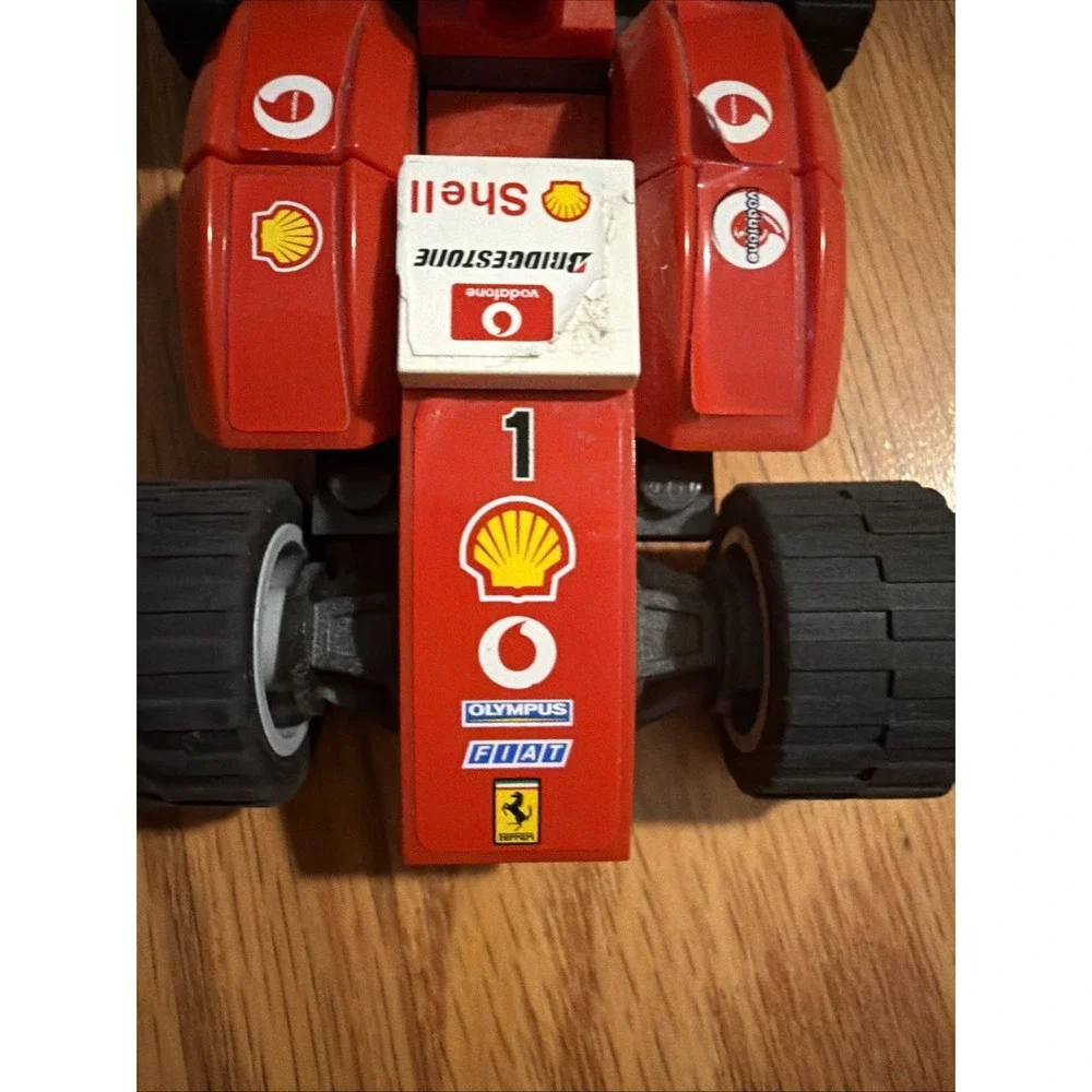 Red Lego Ferrari Bridgestone Shell Four-Wheel Car